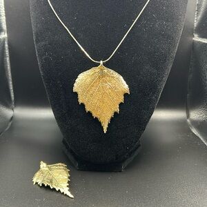 Leaves of Gold, two pendants and one chain. Great  condition!